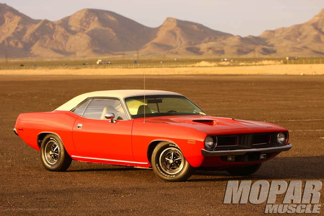 Red muscle car in desert