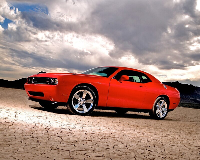 Red muscle car in desert