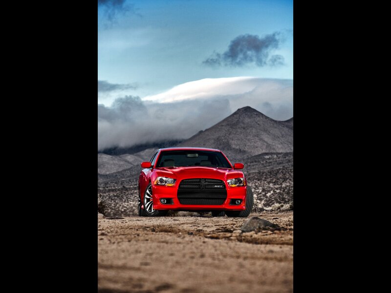 Red muscle car in desert