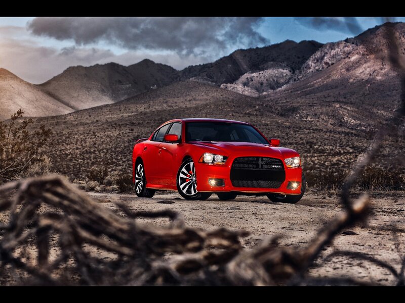 Red muscle car in desert
