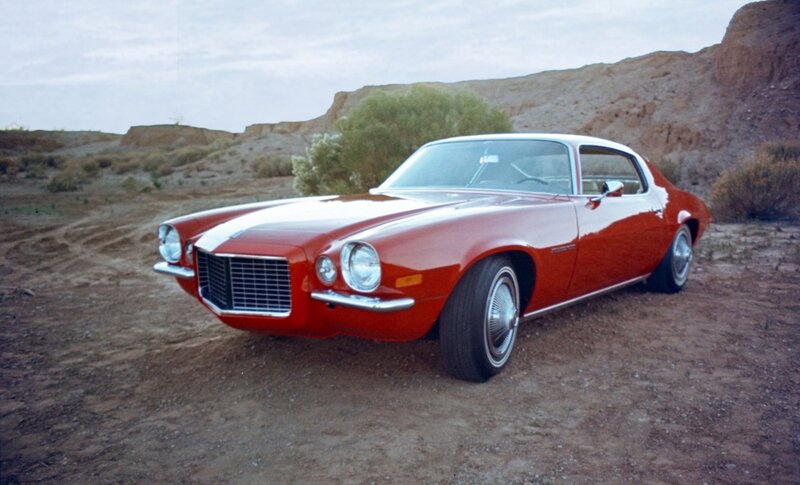 Red muscle car in desert