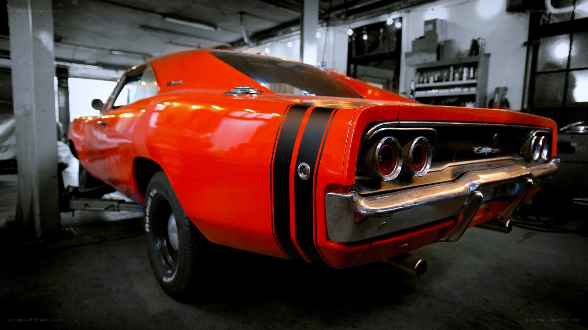 red muscle car in garage