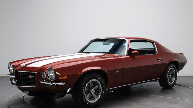 Red Muscle Car — Neutral, Photograph, White Stripes, Chrome Grille, Black Tires, White