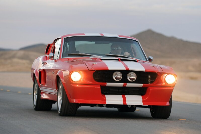 Red muscle car on desert road