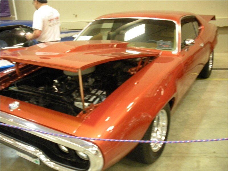 red muscle car on display