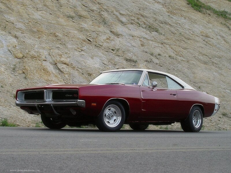 Red muscle car on road
