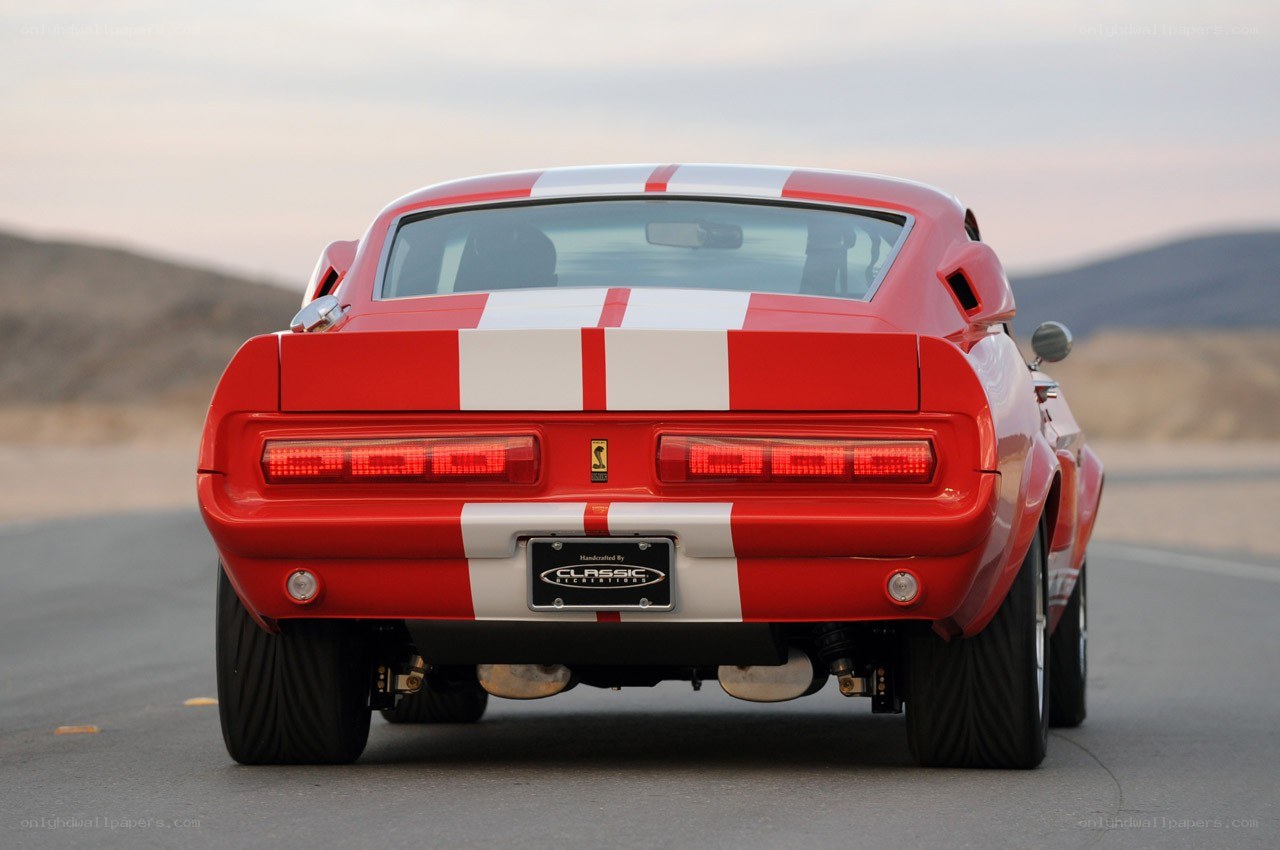 red muscle car on road