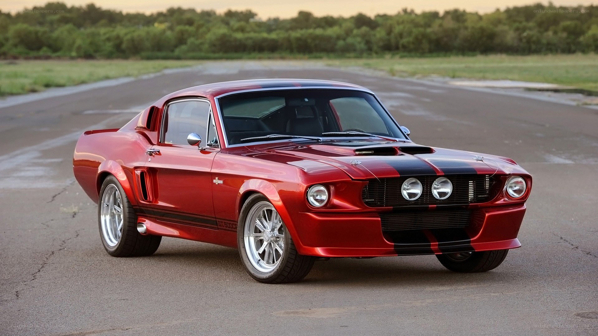red muscle car on track