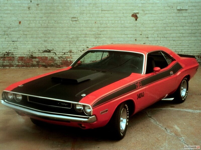 Red muscle car with black hood