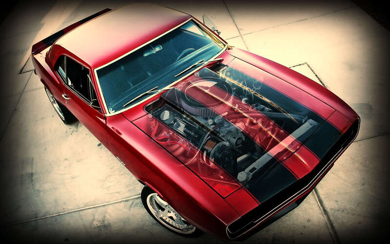 Red muscle car with engine view