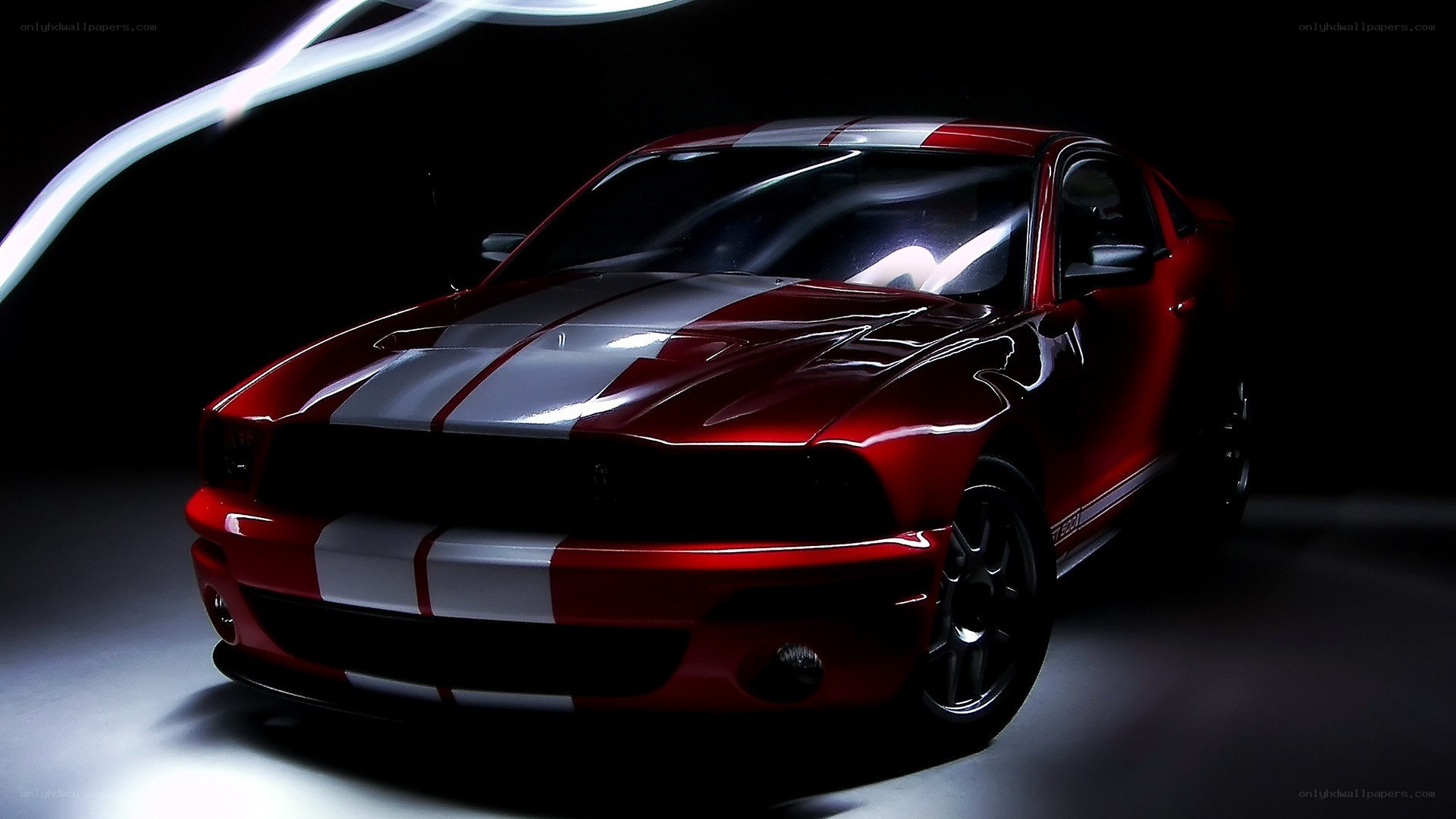 Red muscle car with racing stripes