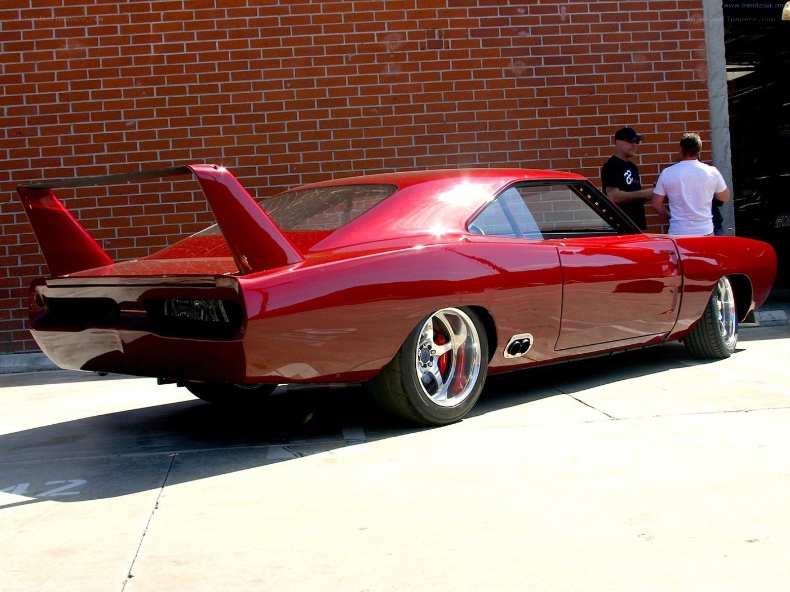 Red muscle car with wing