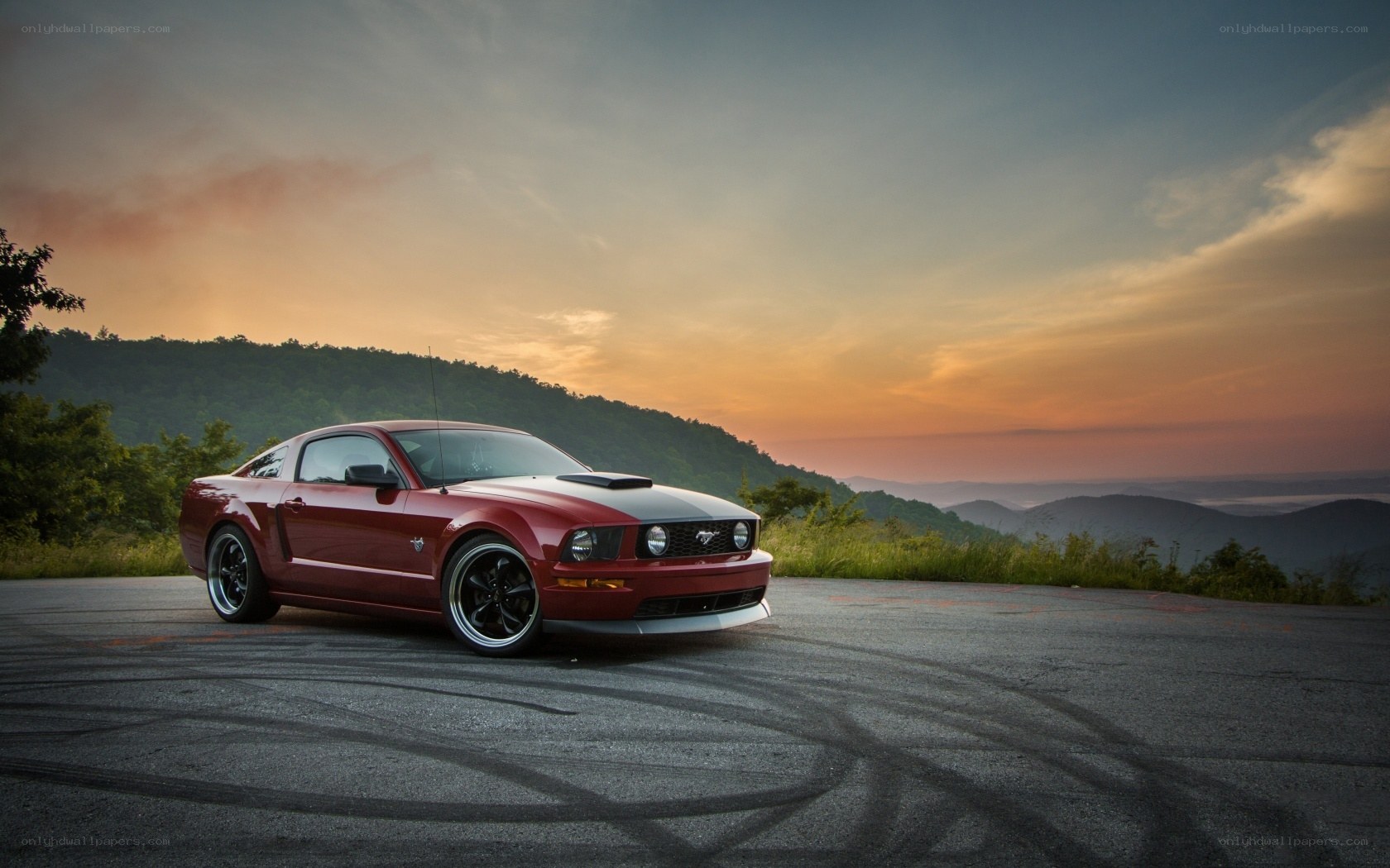 Red Mustang at sunset