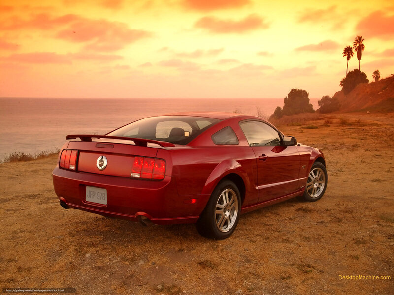 Red Mustang at sunset