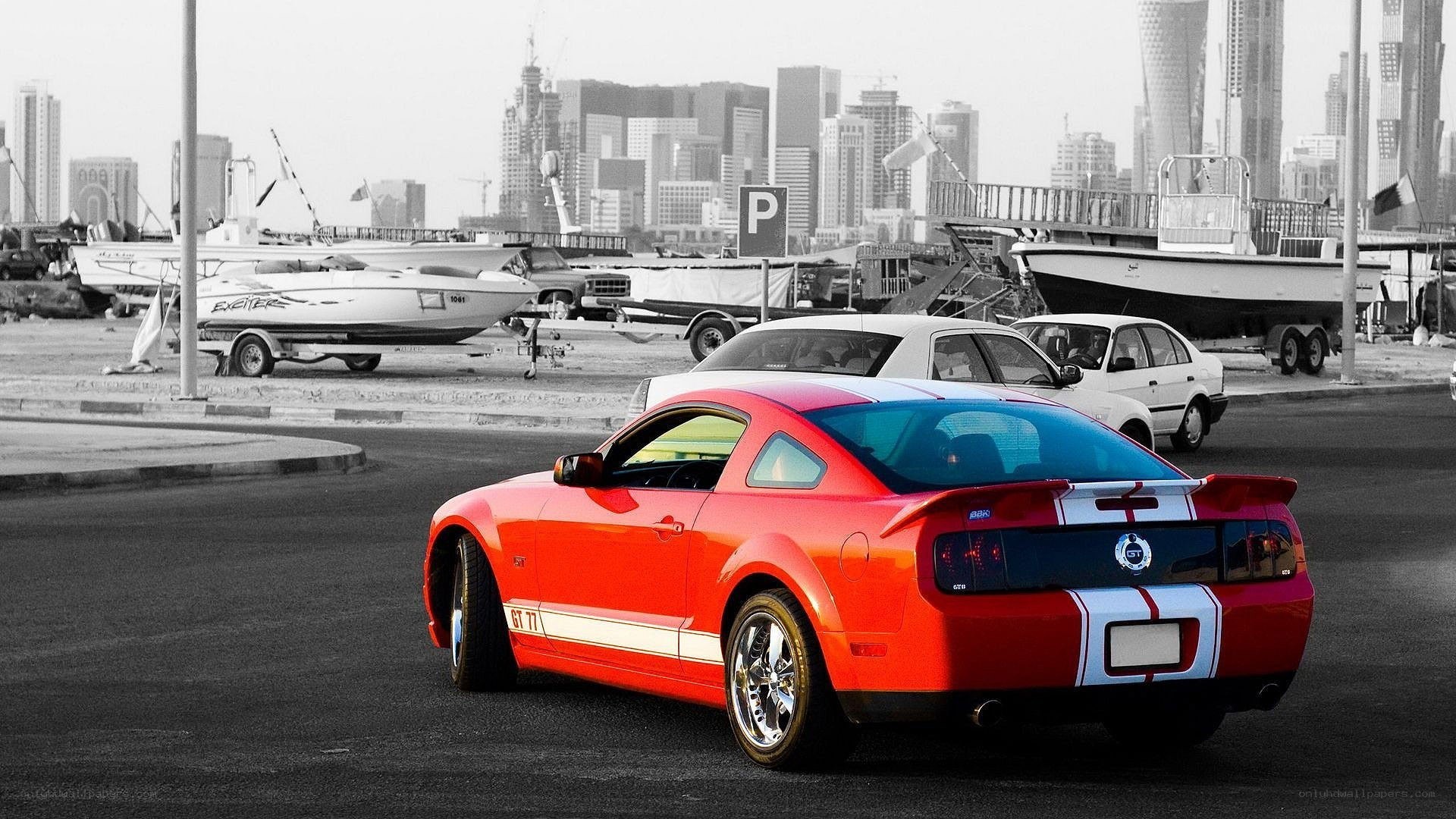 Red Mustang in a marina