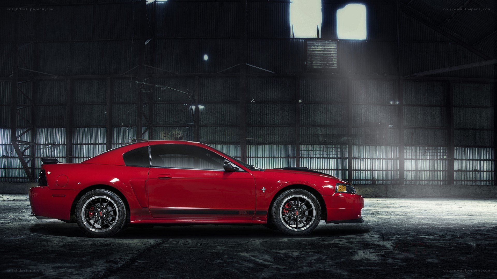 Red Mustang in warehouse