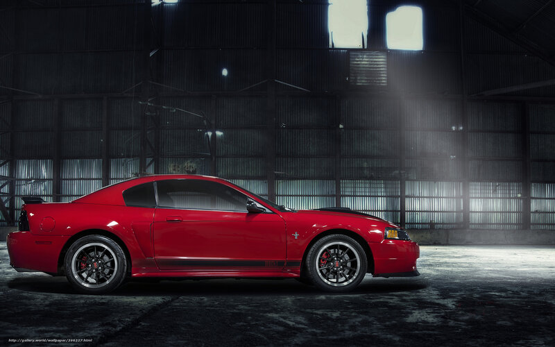 Red Mustang in warehouse