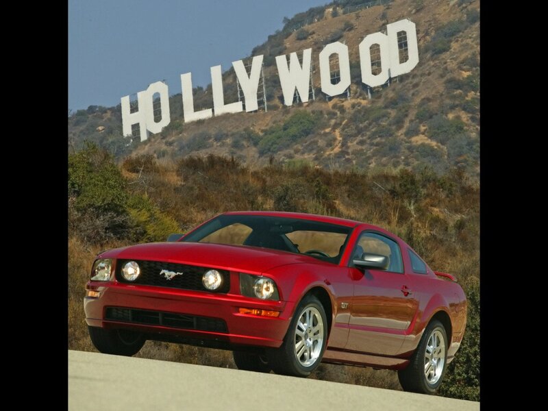 Red Mustang near Hollywood Sign