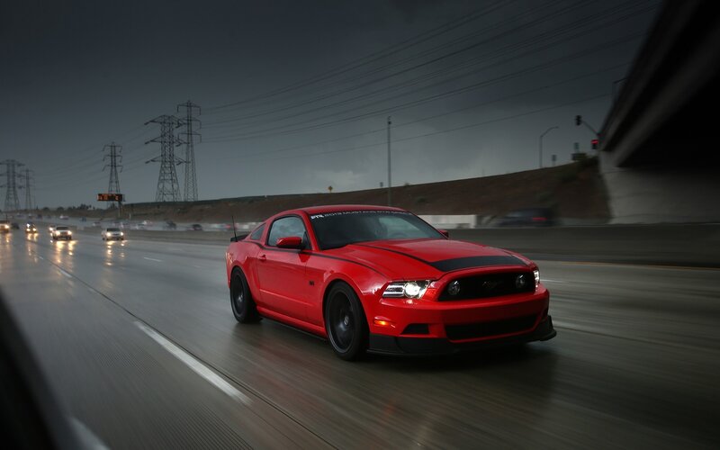 Red Mustang on Highway