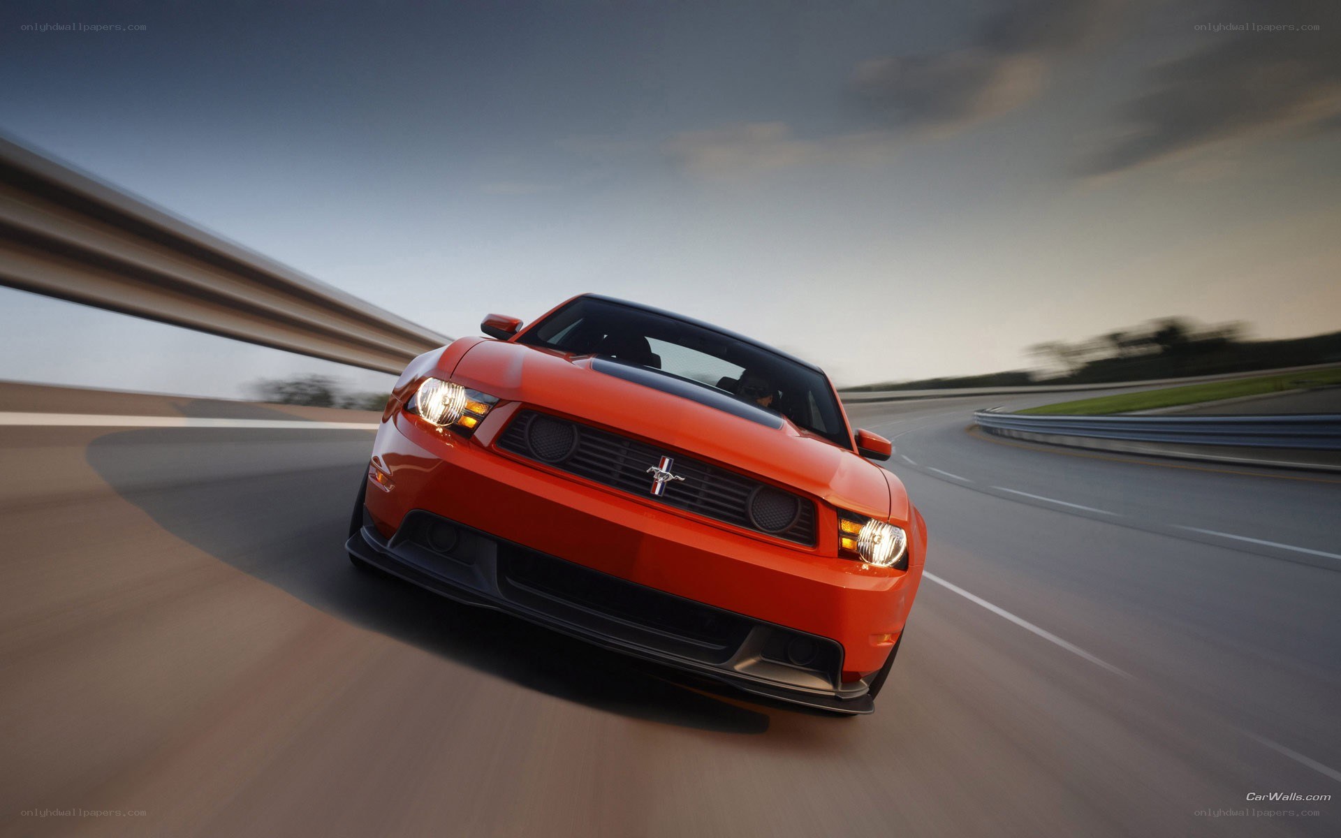 red mustang on racetrack