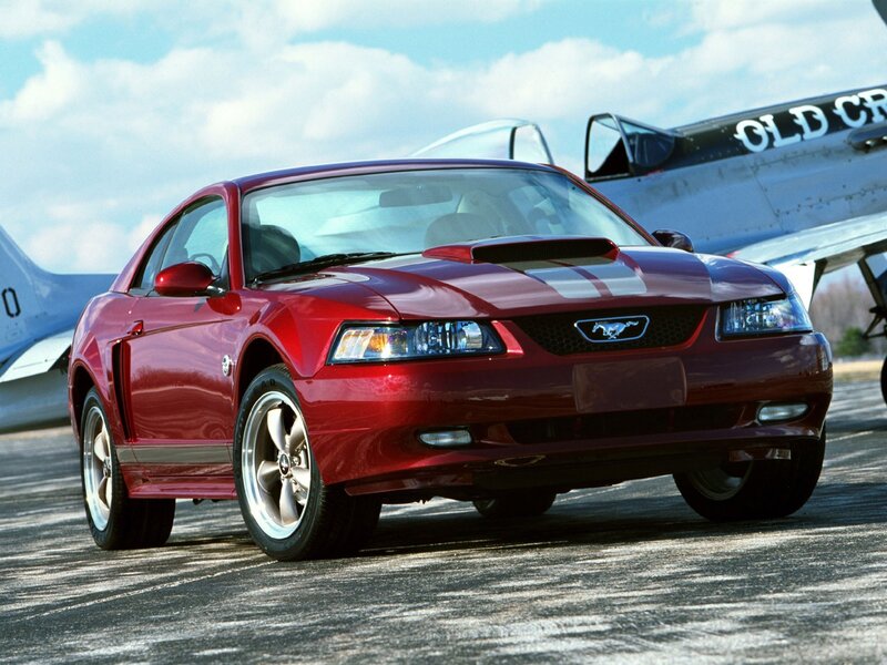 Red Mustang on tarmac