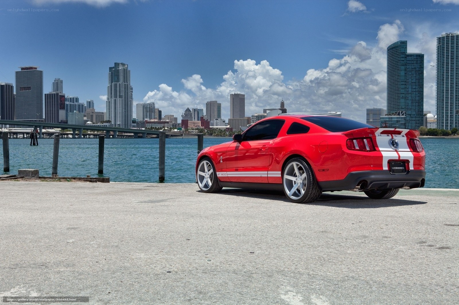 Red Mustang on waterfront