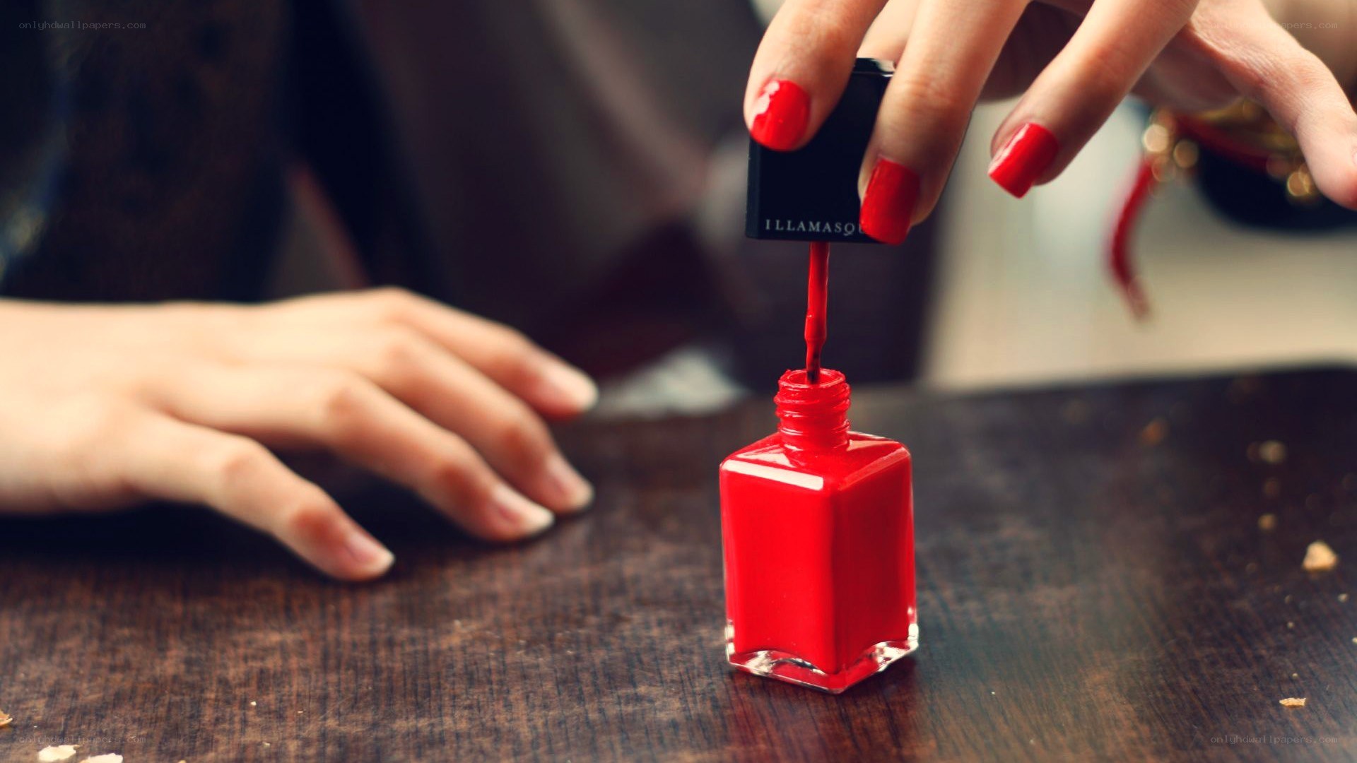 red nail polish application