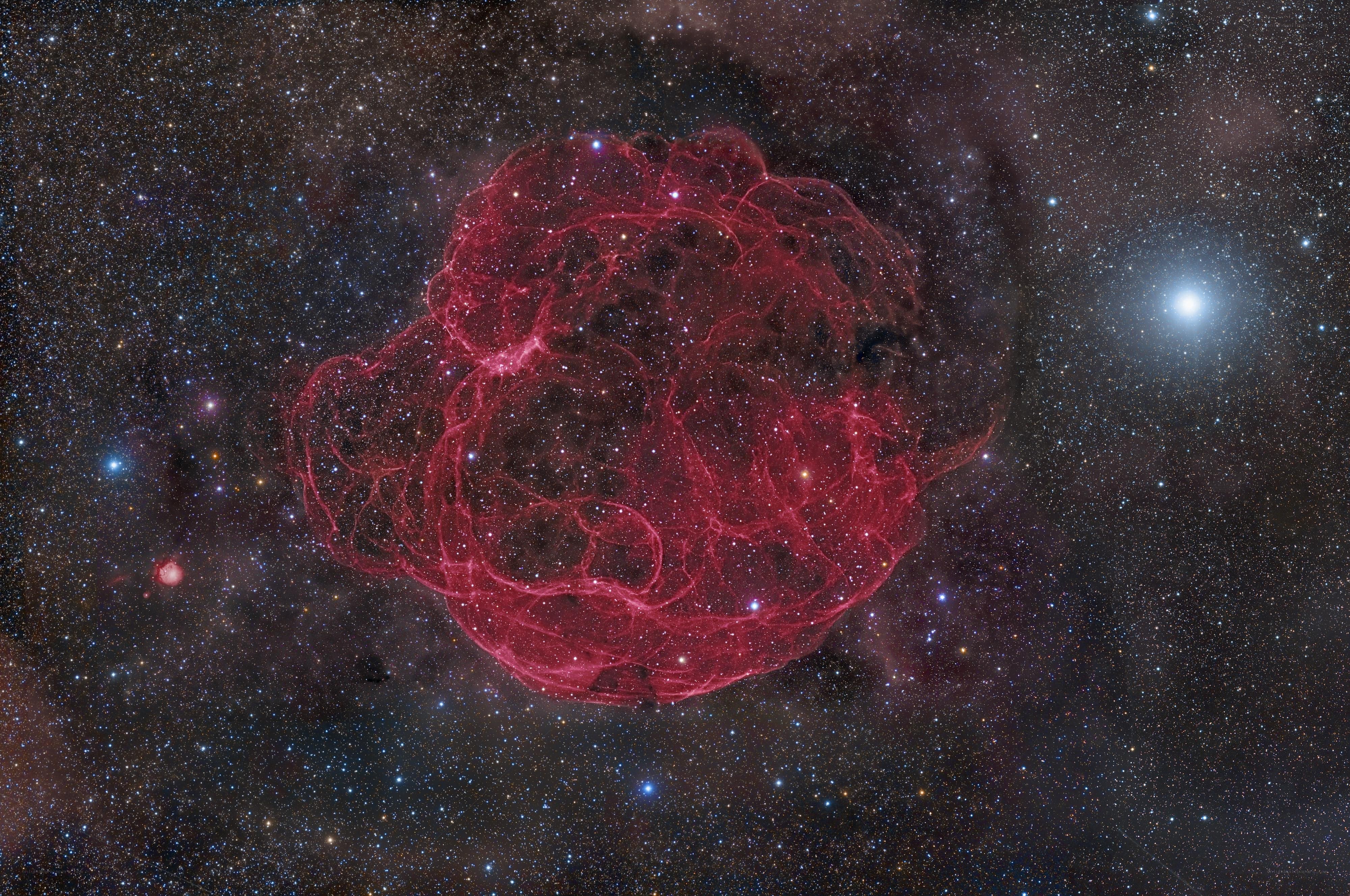 Red Nebula in Star Field
