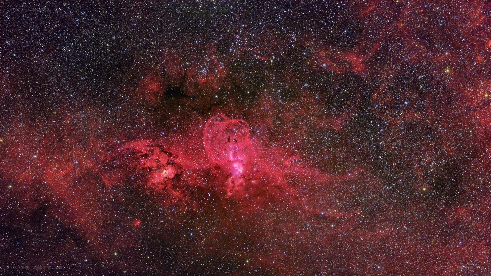 Red nebula in starfield