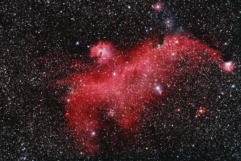 Red nebula in starfield