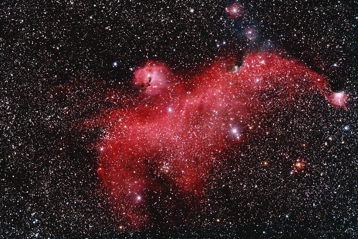Red nebula in starfield
