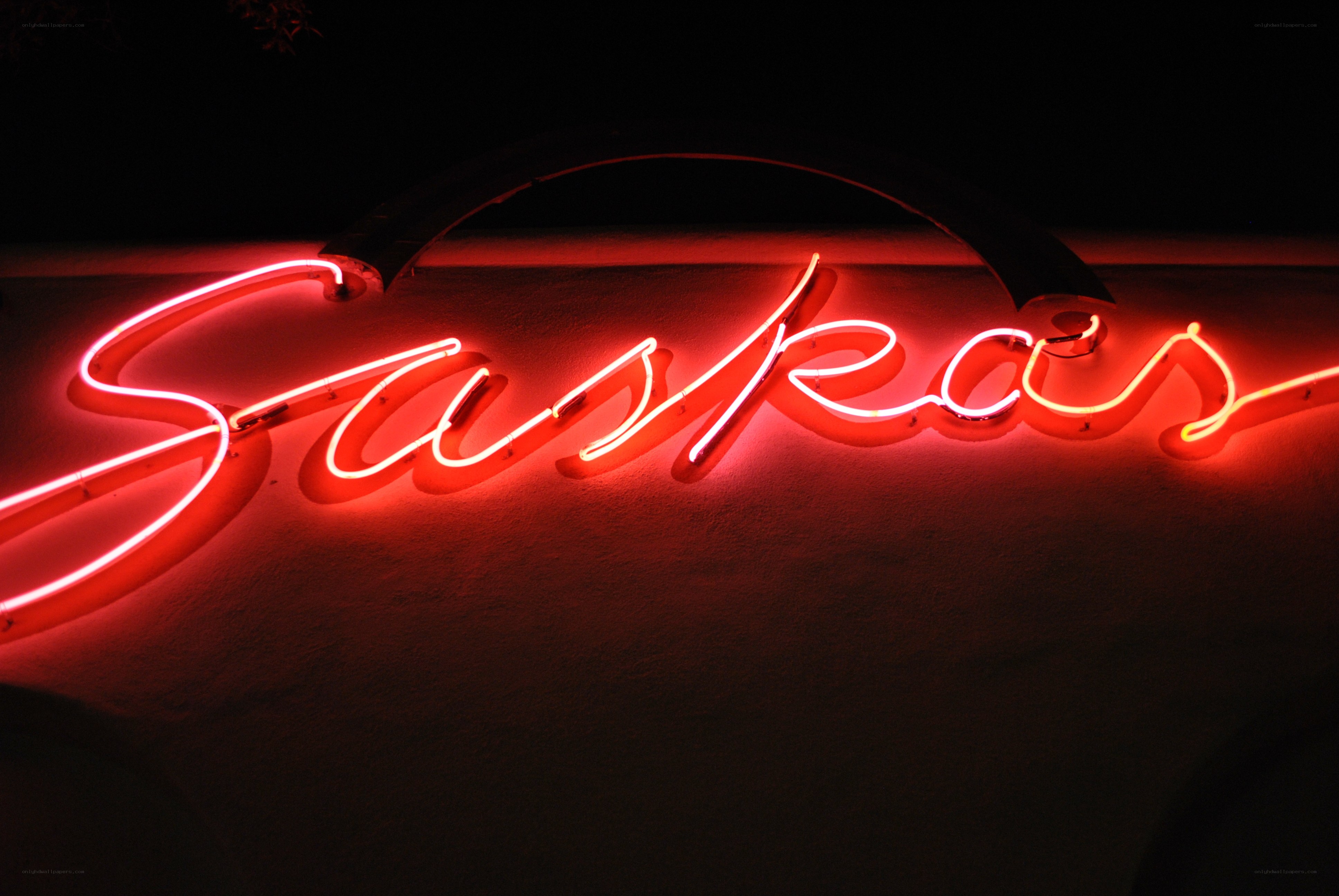 Red neon sign at night