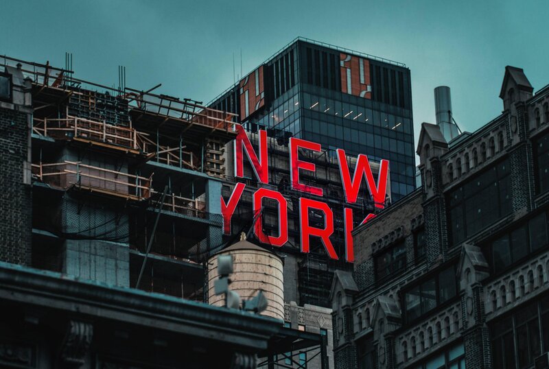 Red Neon Sign on Building