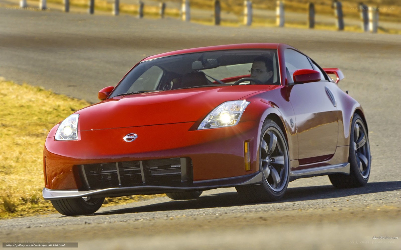 Red Nissan 350Z in motion