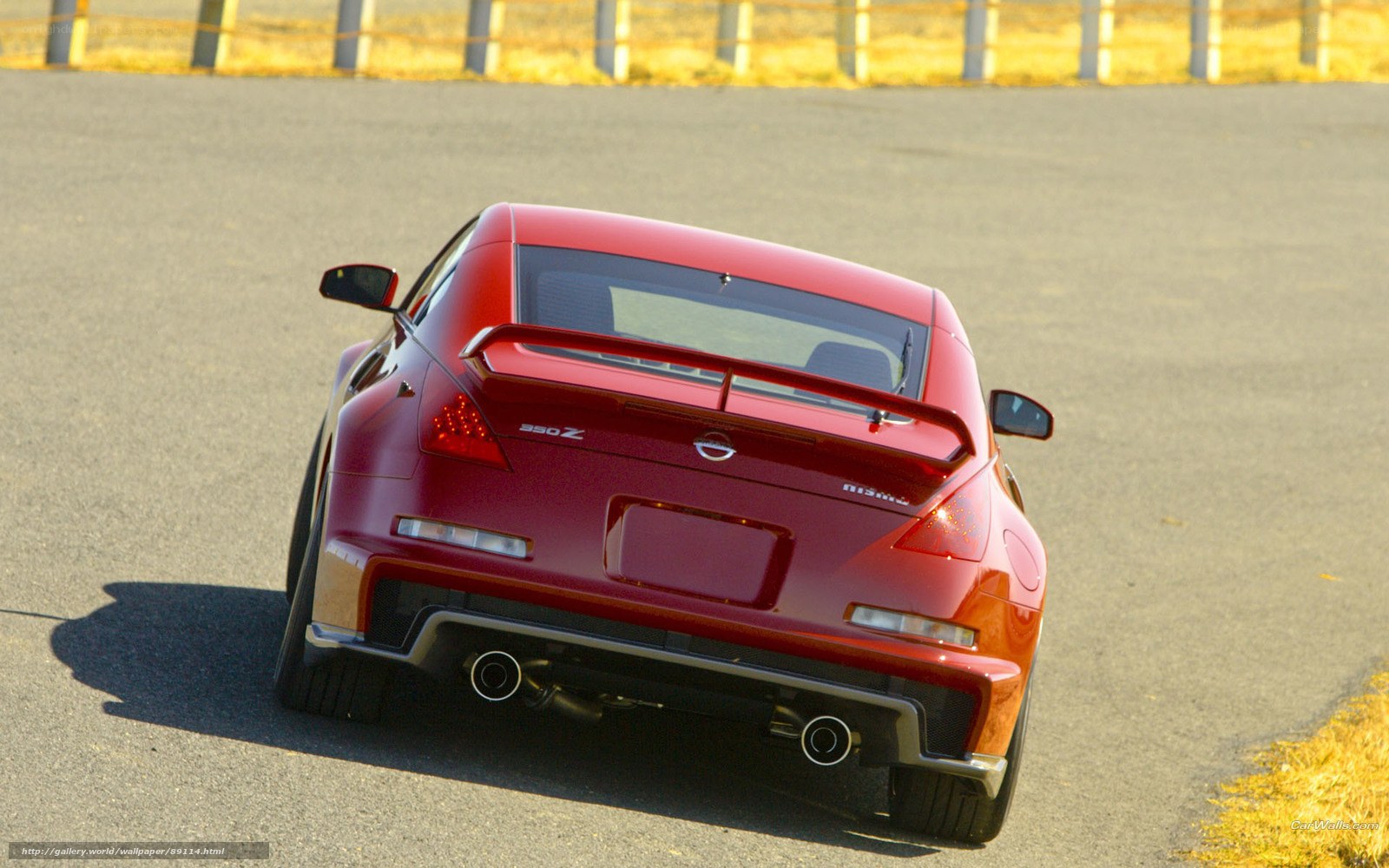 Red Nissan 350Z on track