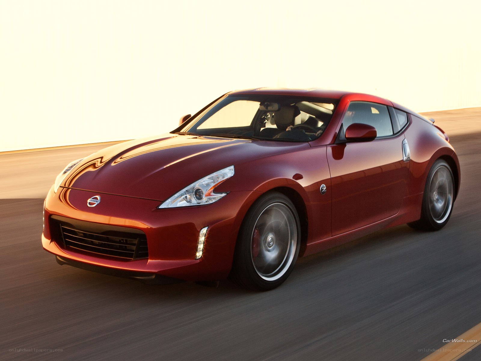 Red Nissan 370Z in motion