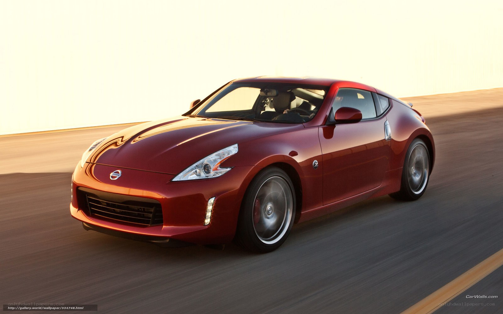 Red Nissan 370Z in motion