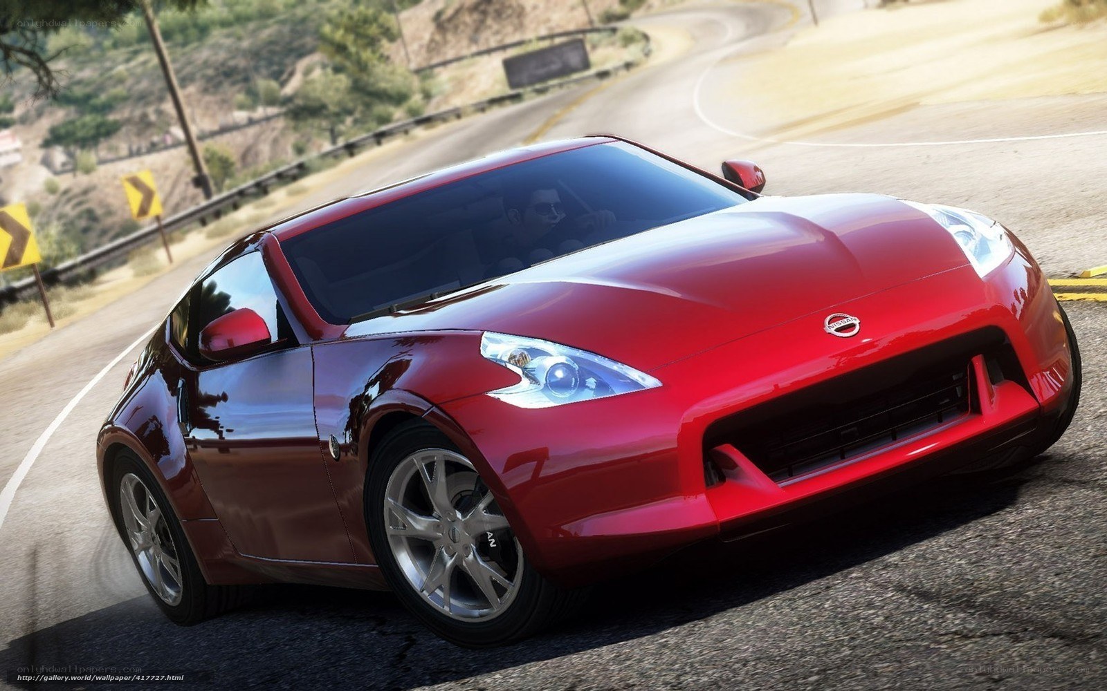 Red Nissan 370Z on winding road