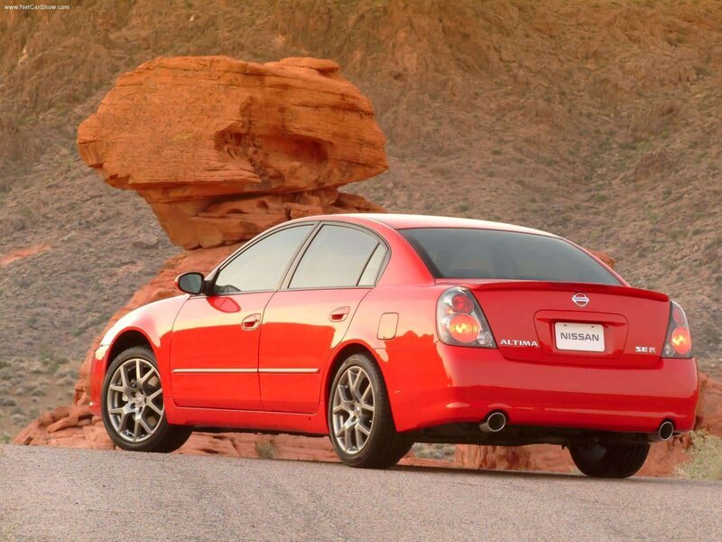 Red Nissan Altima Sedan — Dramatic