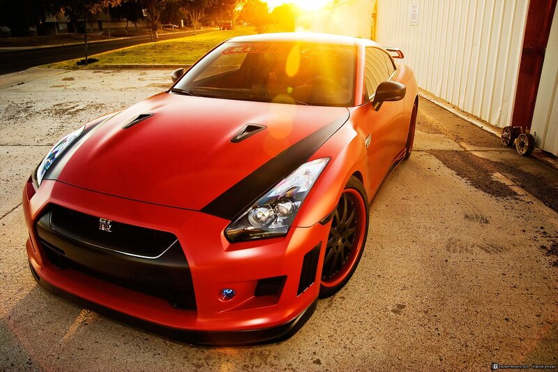Red Nissan GT-R at sunset