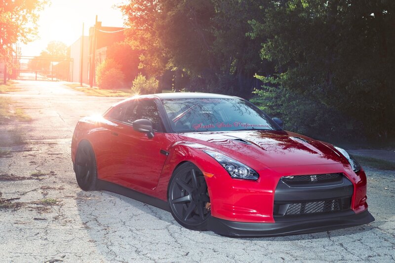 Red Nissan GT-R at sunset