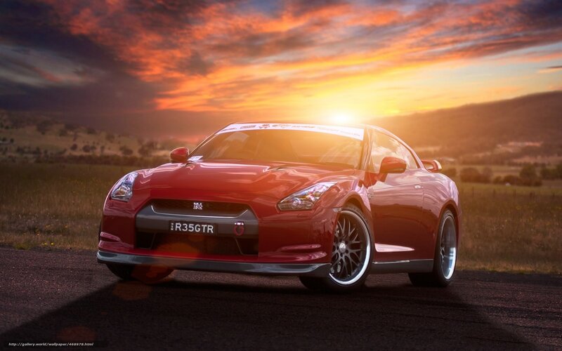Red Nissan GT-R at sunset