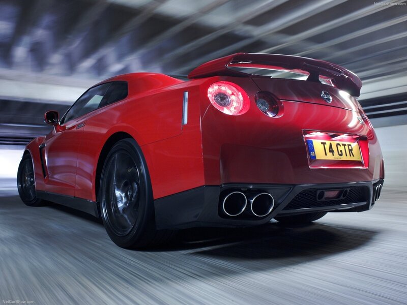 Red Nissan GT-R in motion