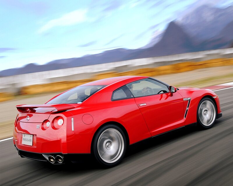 Red Nissan GT-R in motion