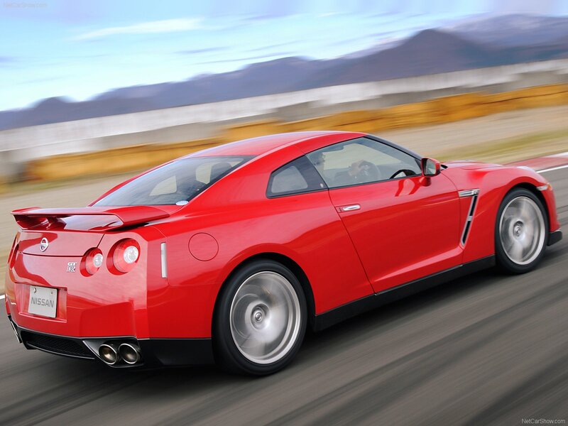 Red Nissan GT-R in motion