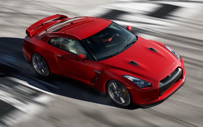 Red Nissan GT-R in motion