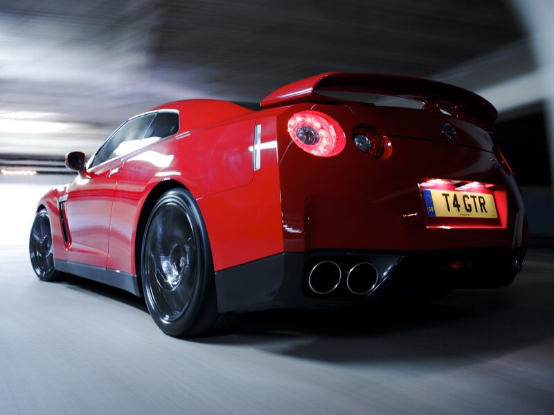 Red Nissan GT-R in motion