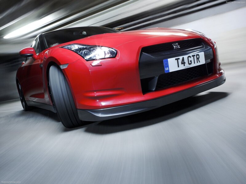 Red Nissan GT-R in motion