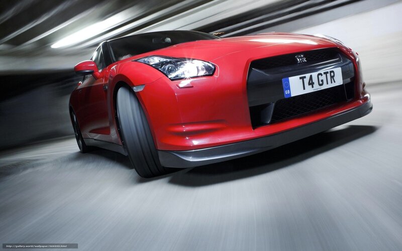 Red Nissan GT-R in motion
