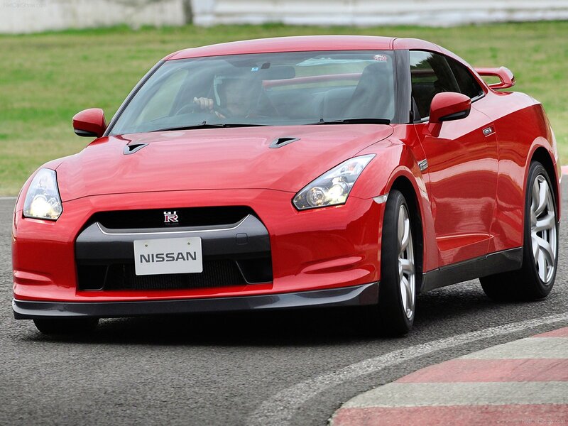 Red Nissan GT-R on a racetrack